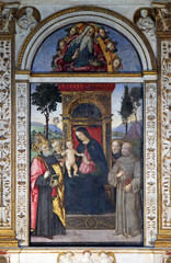 The fresco Madonna with the child and saints by Aiuto del Pinturicchio (1489 - 1491) in Basso della Rovere chapel in Church of Santa Maria del Popolo, Rome, Italy
