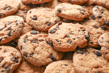 Tasty chocolate chip cookies as background