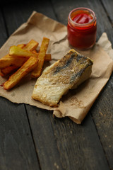 Fish and Fries (white fish with salmon, portion). food background. copy space