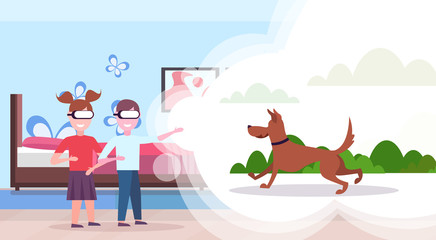 Two kids sister and brother wearing digital glasses virtual reality dog running and playing outdoor modern bedroom interior vr vision headset concept horizontal flat