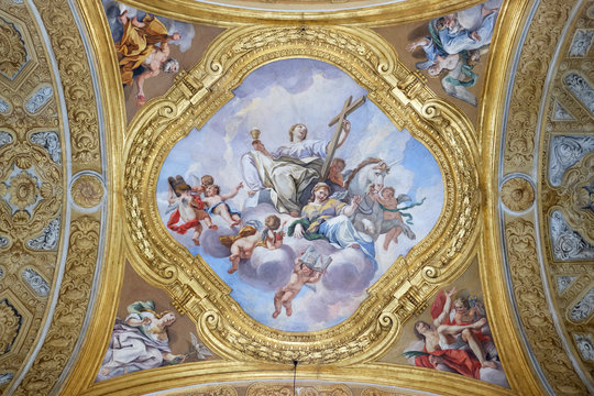The fresco of virtues on the little cupola of side nave in Basilica dei Santi Ambrogio e Carlo al Corso by Pio Paolini from (1678 - 81), Rome, Italy