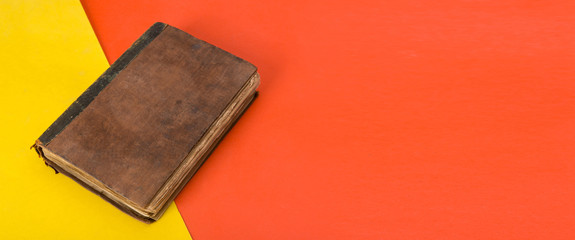 vintage style book close up on wooden background banner mockup