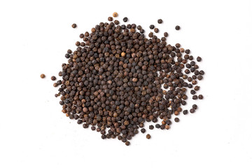 Indian spices black pepper grains on white background