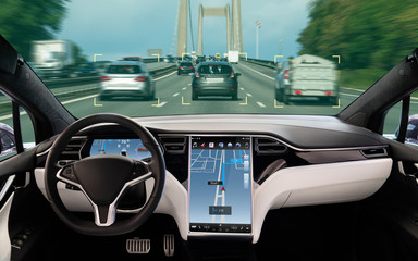 Self driving car on a road. Autonomous vehicle. Inside view. 