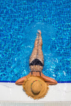 Young woman in swimming pool