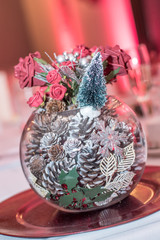 Wedding table floral decoration in glass bowl