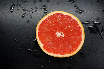 grapefruit half. red juicy fresh fruit