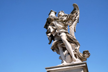 Obraz premium Statue of Angel with the Column by Antonio Raggi, Ponte Sant Angelo in Rome, Italy 