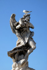 Statue of Angel with the Superscription by Gian Lorenzo Bernini, Ponte Sant Angelo in Rome, Italy  