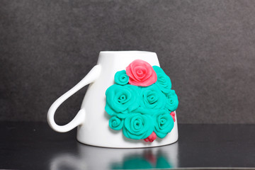 Mug, decorated with flowers made of polymer clay. Crafts from polymer clay. Mug decorated with...