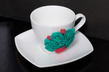Mug, decorated with flowers made of polymer clay. Crafts from polymer clay. Mug decorated with...
