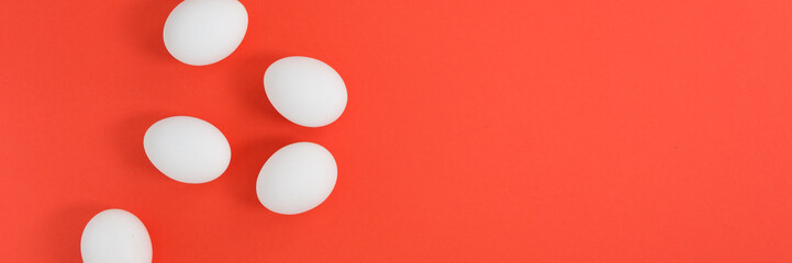 Frame from a creative layout of white eggs on the color of the year