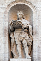 Fototapeta na wymiar Statue of king St. Louis of France on the facade of Chiesa di San Luigi dei Francesi - Church of St Louis of the French, Rome, Italy