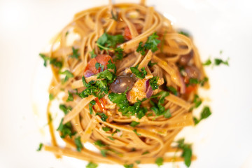 Italian Pasta with onion, tuna, and taggiasche olives