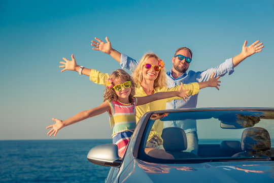 Happy family travel by car