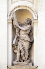 Saint Andrew by Luca Breton on the facade of Santi Claudio e Andrea dei Borgognoni