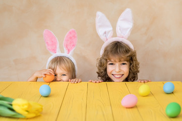 Obraz na płótnie Canvas Funny kids wearing Easter bunny