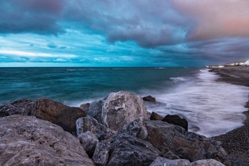 Night seascape magic atmosphere sea horizon rocks in the sea 