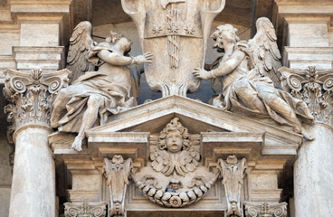 Fototapeta na wymiar Angels, Church of Saints Vincent and Anastasius at Trevi in Rome, Italy