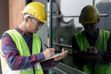Construction concept , Foreman officer inspector defect about engineer&architect work home building...