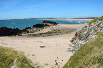 Fototapeta na wymiar Stunningly sandy beaches on and around Llanddwyn Island which is situated of the beautiful Isle of Anglesey in North Wales