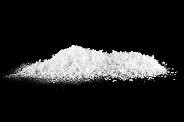Heap of white snow on black background
