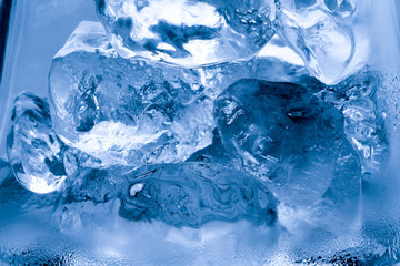 Fototapeta na wymiar Ice melts in studio, global warming concept