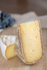 French hard cow or goat cheese Tomme or Tome, produced in French Alps