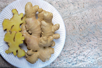 Fresh raw ginger root from China close up