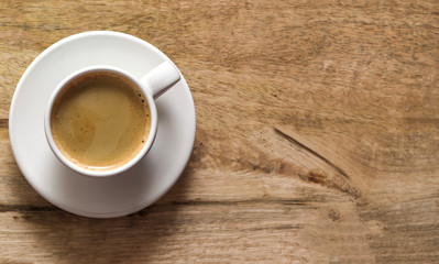 cup of coffee. Rustic wooden background. Copy space. Top view