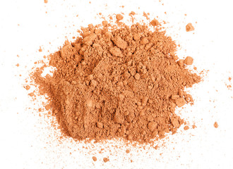 top view of handful of cocoa powder isolated
