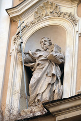 Statue of Saint John of Matha on facade of Santissima Trinita degli Spagnoli Church in Rome, Italy 