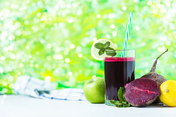 fresh juice from homemade vegetables. Beet smoothie. Detox, vegetarianism On a bright summer background