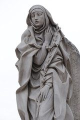 Statue of Saint Catherine of Siena near Sant Angelo Castle in Rome, Italy 