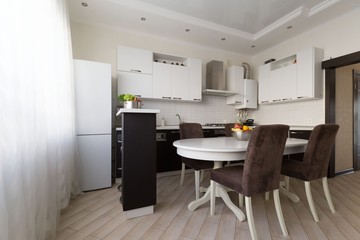 Interior. Kitchen modern, white, brown, beige color, doors
