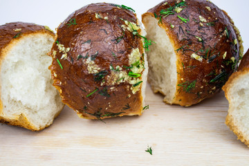Close-up of freshly baked garlic and herb bread baguette. close-up. view from above. isolate