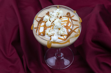 Banana smoothie with caramel and popcorn