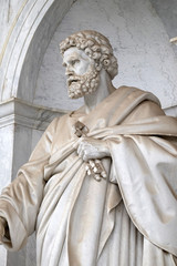 Obraz premium Saint Peter statue in front of the basilica of Saint Paul Outside the Walls, Rome, Italy