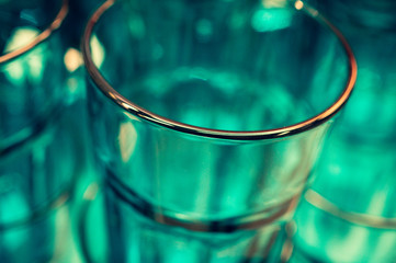 Blue glasses stacked on top of each other