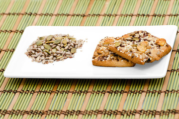 Biscuits and seeds on a plate