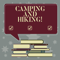 Conceptual hand writing showing Camping And Hiking. Business photo showcasing outdoor activity involving staying away from home Uneven Pile of Hardbound Books and Rectangular Speech Bubble