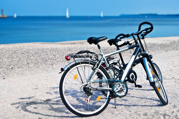 Fototapeta premium Two bicycles and beach