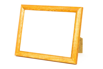 Standing wooden picture frame on white background