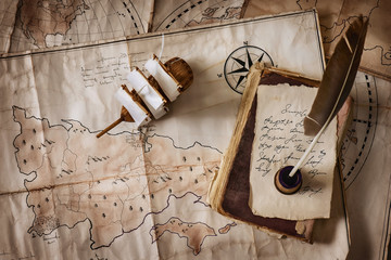 Vintage old maps and objects traveler-explorer