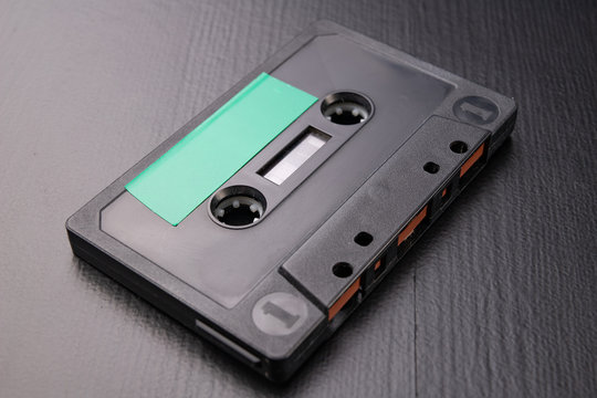 Audio cassette with space for text entry. Cassette without description.
