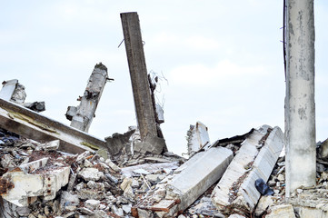 Large concrete piles continue to hold the body of the large concrete buildings, while others look...