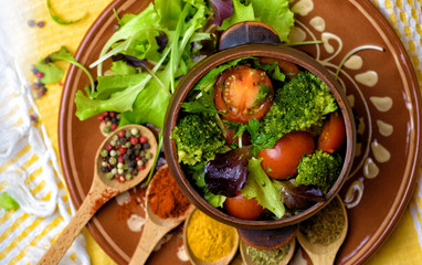 Broccoli and tomato salad with herbs and spices