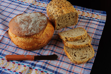 fresh variety bread on black background