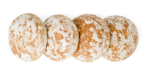 Gingerbread lie in a row on a white. The form of the top.