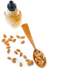 Oil and seeds pumpkins isolated on white background. Free space for text.